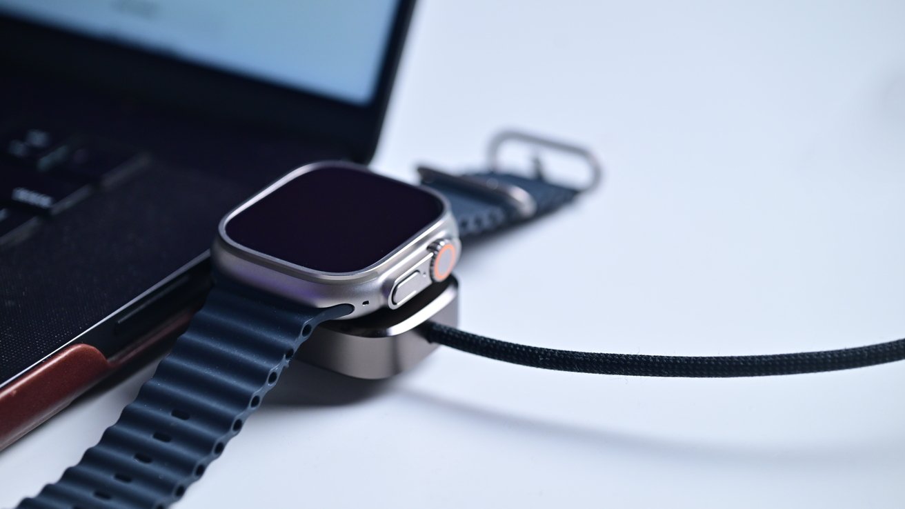 The new Nomad cable plugged into a MacBook Pro charging an Apple Watch