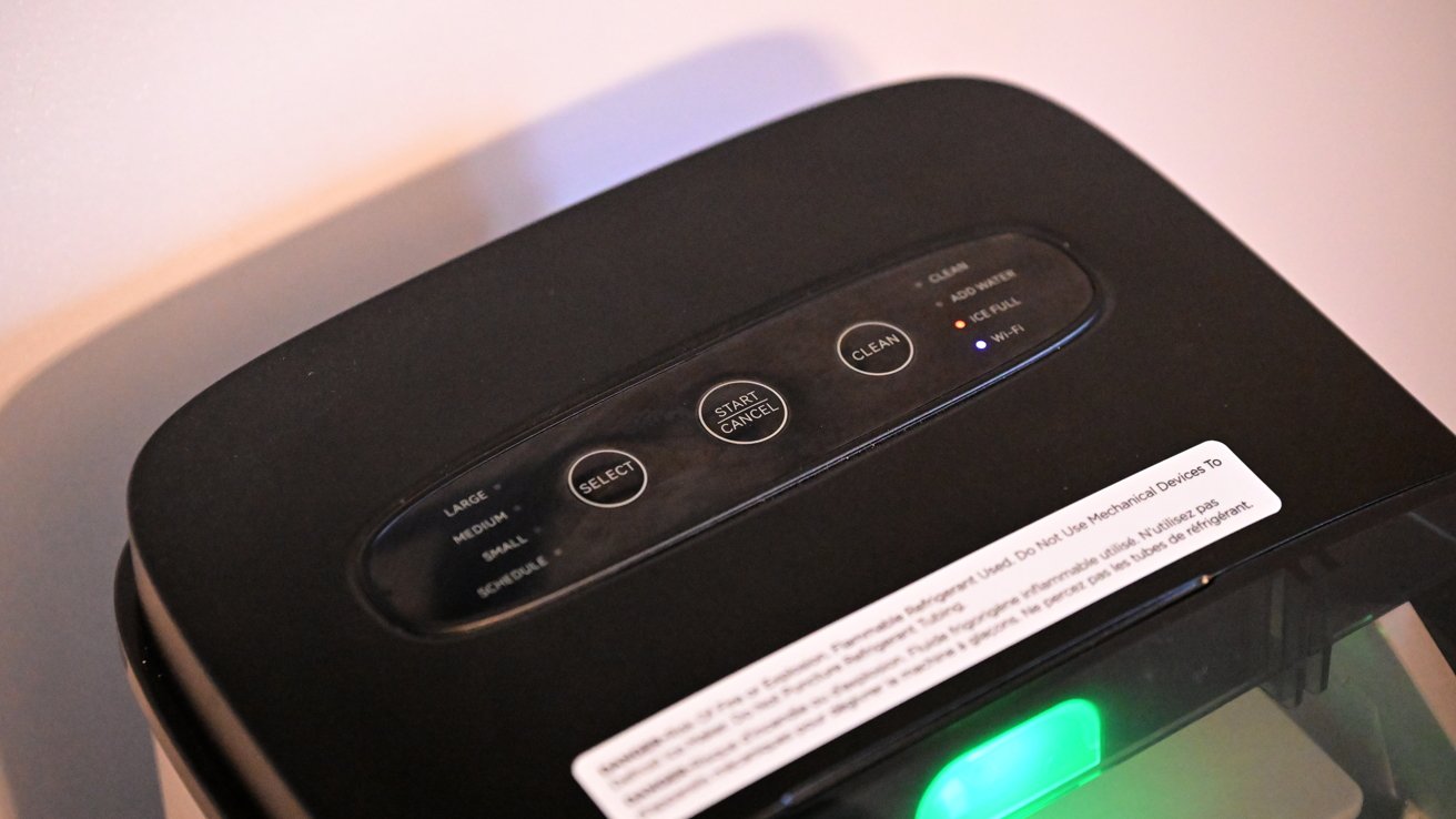 Buttons on top of an ice maker with options for the size of ice, start and stop, and cleaning mode