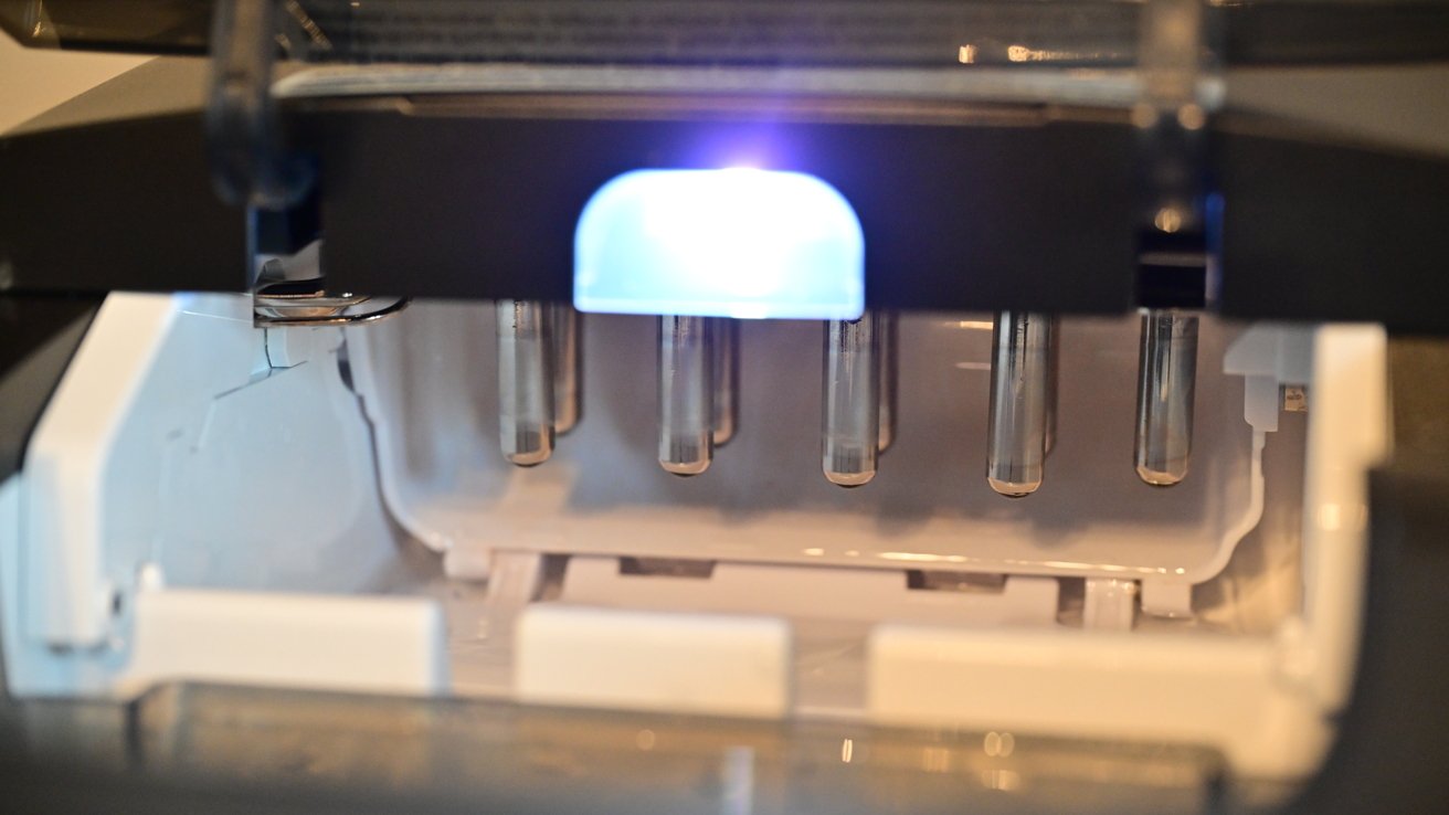 A series of downward-facing metal prongs inside an appliance
